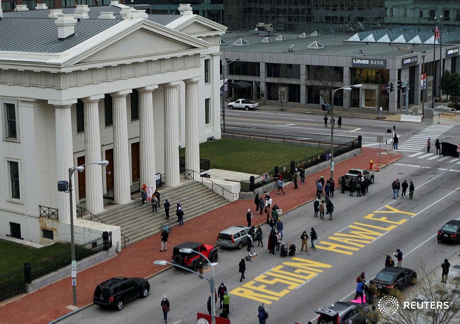 "Resign Hawley" (hint, hint) painted  on a street in St. Louis.