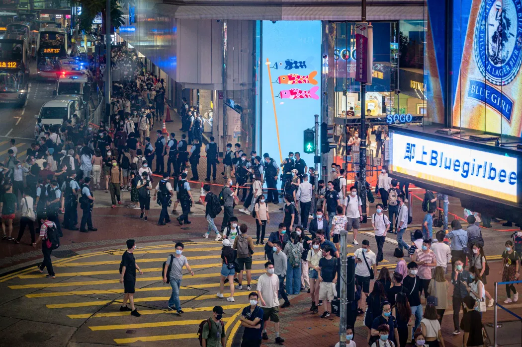 Hong Kong national security police&nbsp;home searched and confiscated the travel documents of a reporter&nbsp;who filmed police stabbing from leaving city.&nbsp;