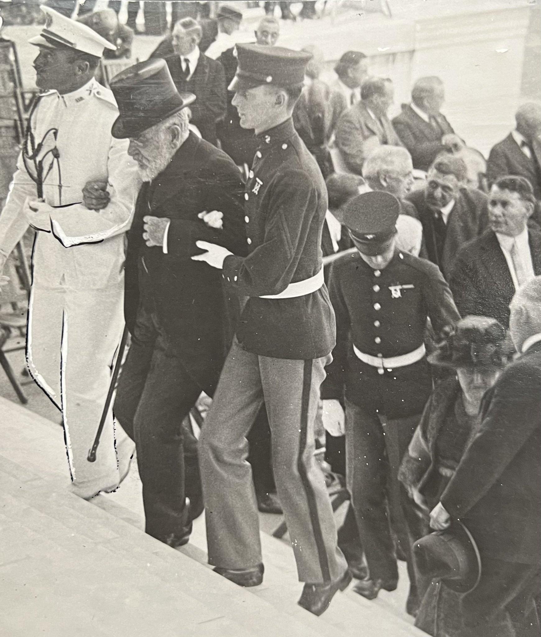 More than 57 years after his father was assassinated, a frail 79 year old Robert T. Lincoln is helped up the steps at the dedication of the Lincoln Memorial in Washington D.C., Jun 1922