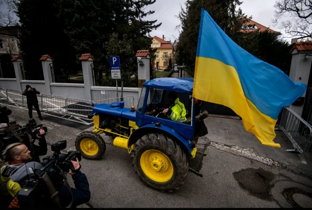 After Russian diplomats from Slovakia were expelled, a tractor in Ukrainian colors was parked in front of the embassy. Fight for freedom, Stand with Ukrainian.