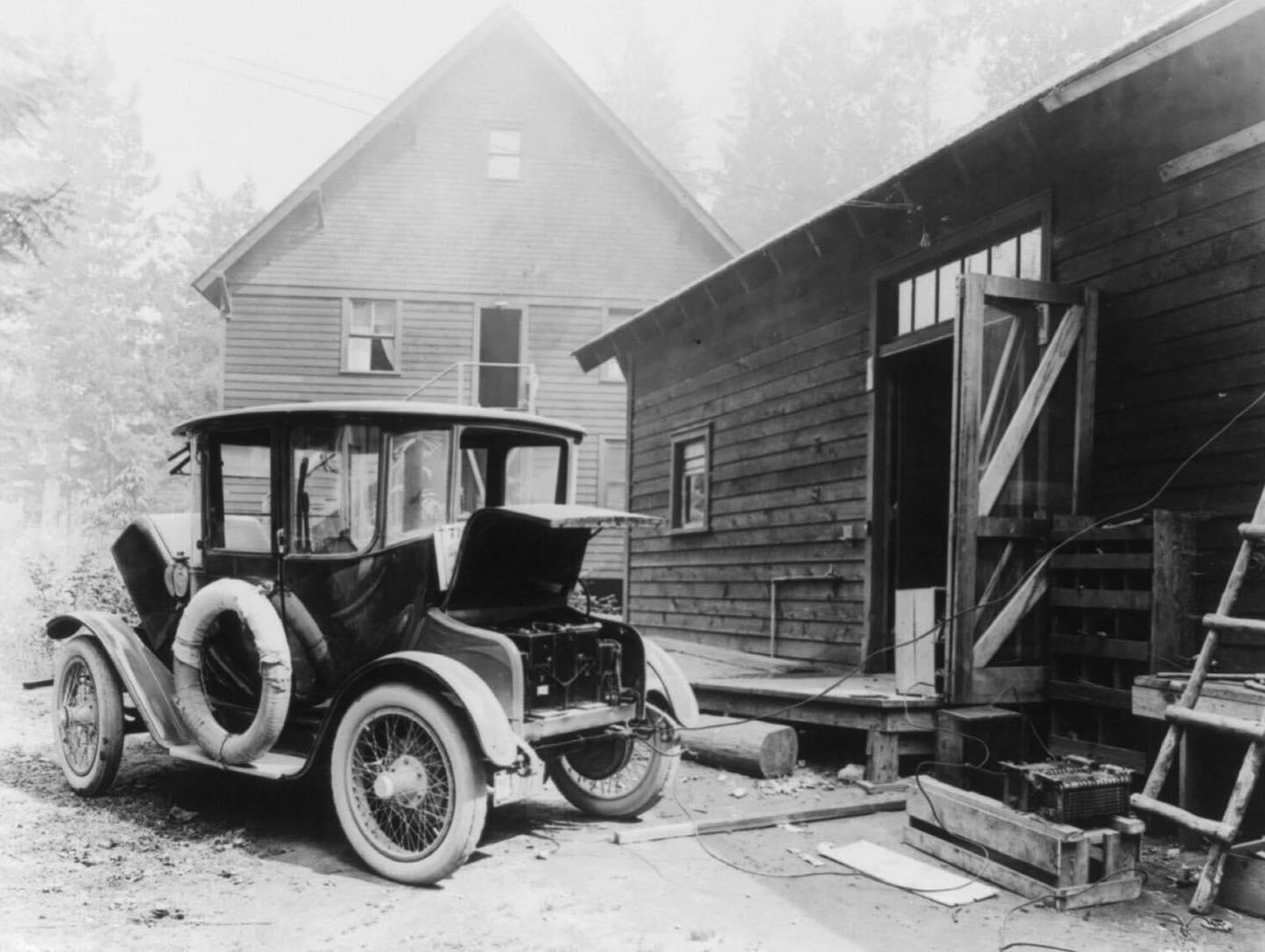 Electric car in a private charging station. USA, 1919.
