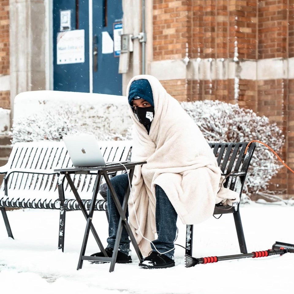 Chicago public school teacher Dwayne Reed, who's wife is eight months pregnant with their first child, requested to work from home to minimize his COVID risk. His school district said no. So Reed's teaching remotely - from right outside his school.