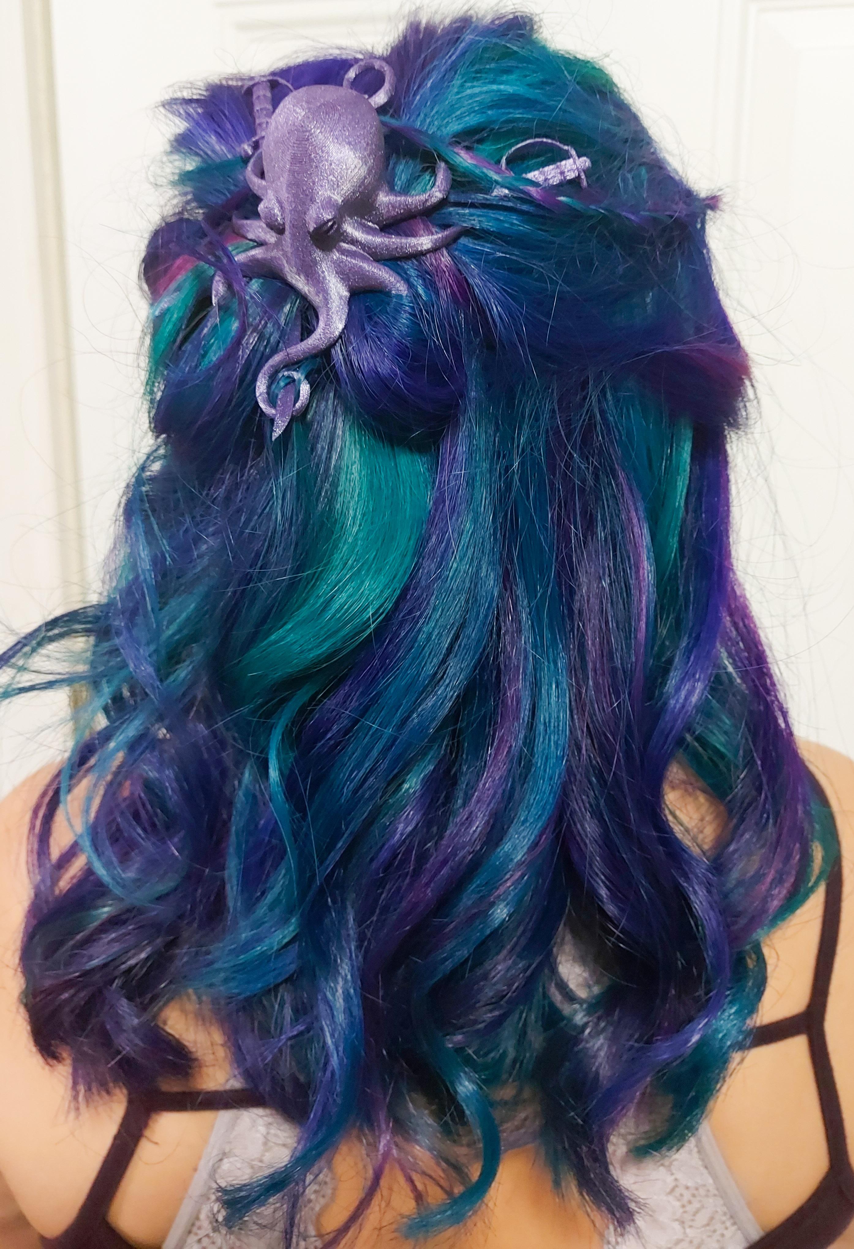 My OC is my work! I run a very small 3D printing gig from home. This is my first official creation, the octopus hair pin!