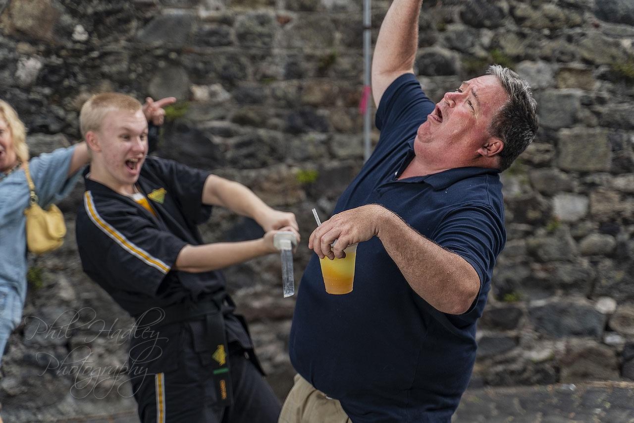 A random guy walked into my karate photo set from the bar next door and wanted his picture taken as well. Sure! ?